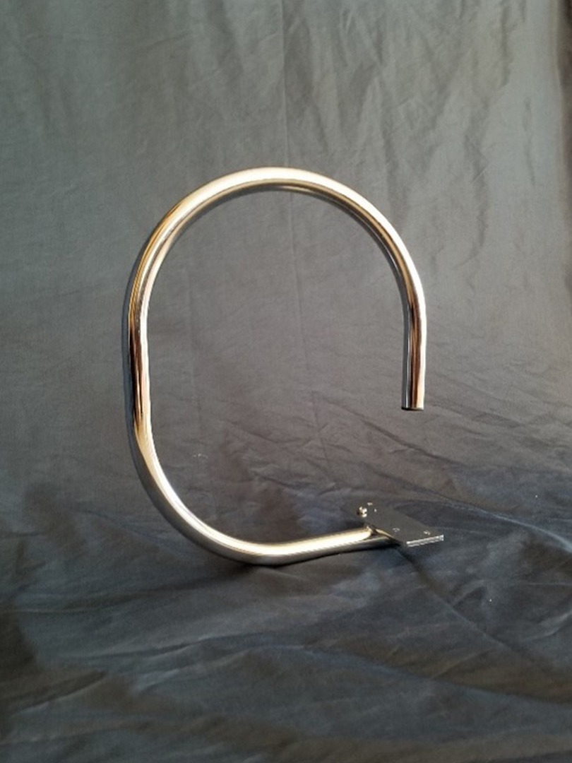 A Polished Stainless Steel Ring Displayed Against a Sleek Black Background, Highlighting Its Reflective Surface and Design.